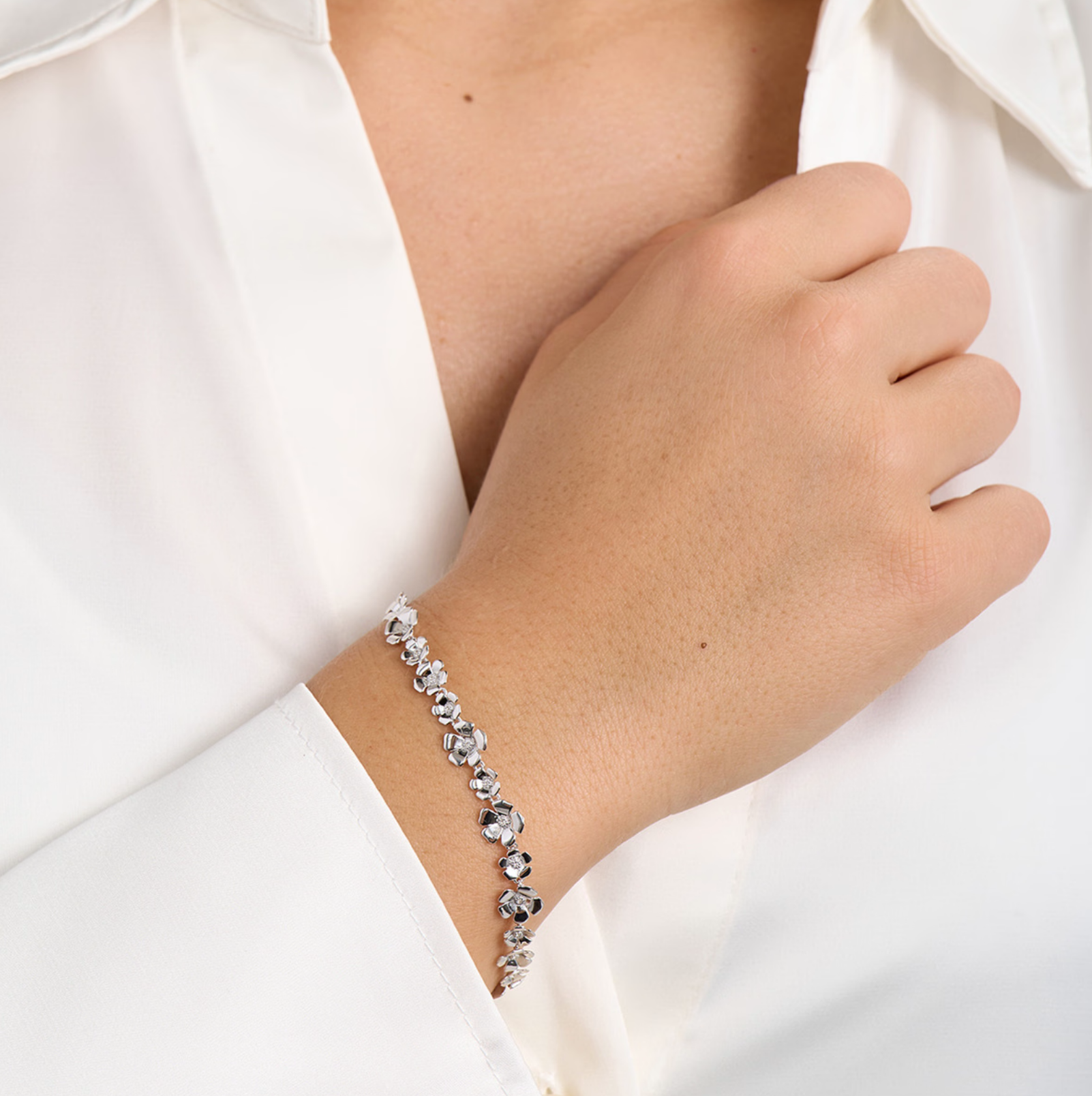 Fleur sølv armbånd m. hvide topaser